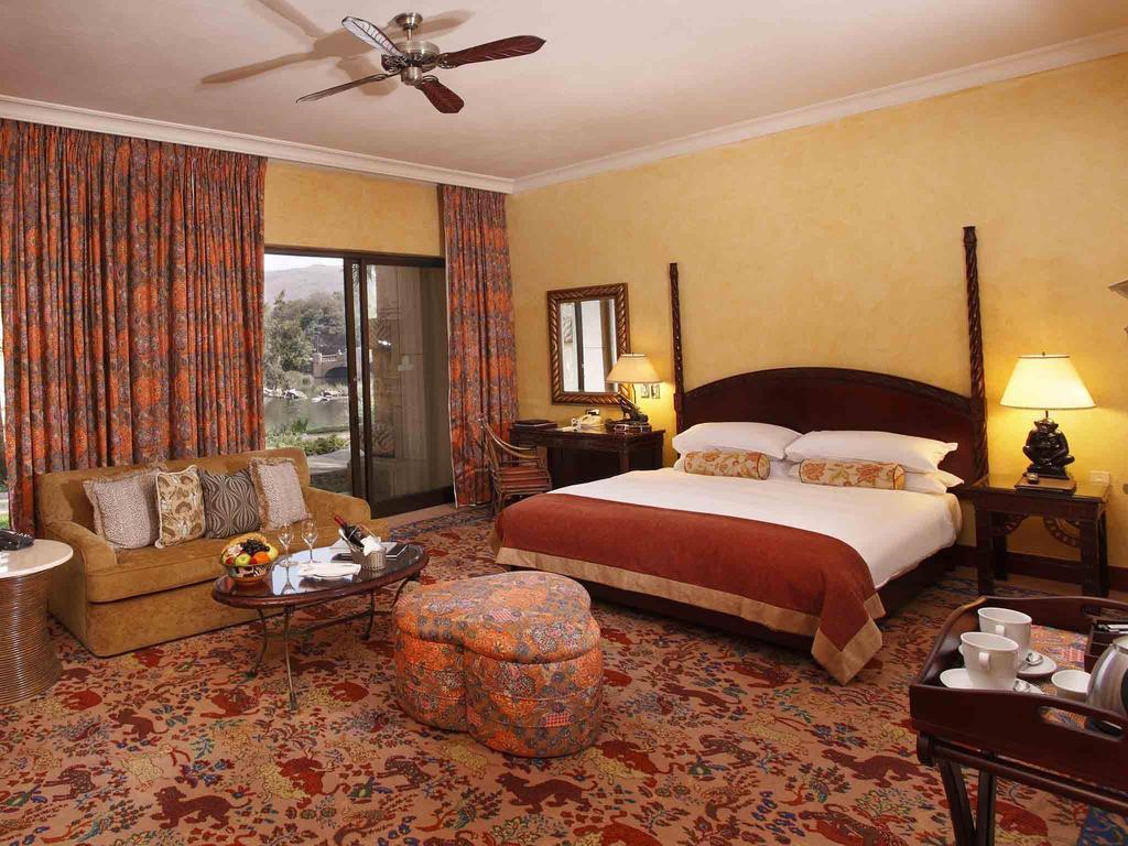 فندق ذا بالاس اوف ذا لوست سيتي أت صن سيتي ريزورت الغرفة الصورة A room at the Taj Mahal Palace